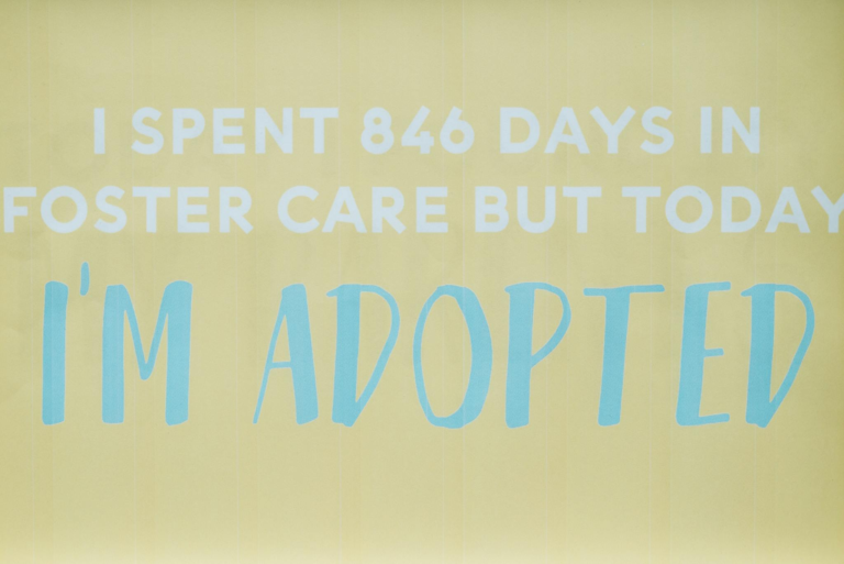 Inspirational message highlighting adoption after foster care journey.